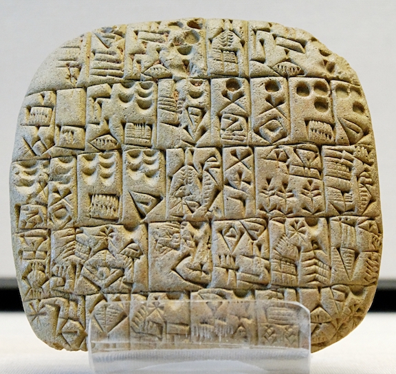 A Sumerian tablet from the Louvre, showing a sales contract for a house and field. Public domain, via Wikimedia Commons.